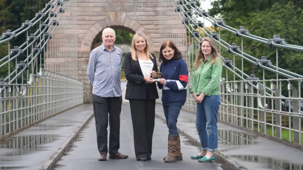 award dedication for historic bridge restoration business manchester